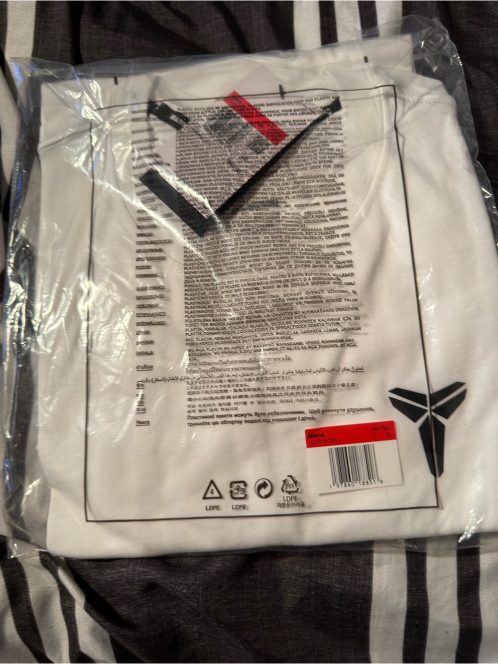 Nike White Short-Sleeve Graphic Tee with Black Logo